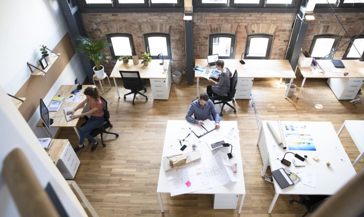 Colleagues working in modern office