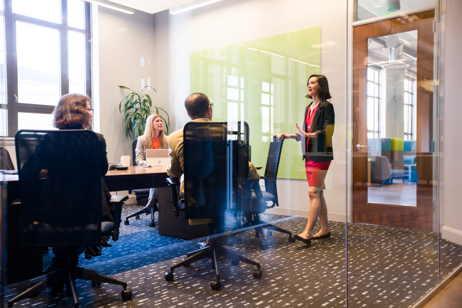 Female CEO leading a business meeting