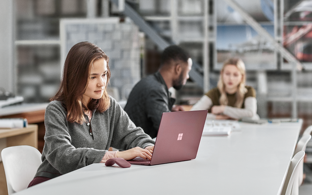 BTS focused student photography in classroom using Surface Laptop