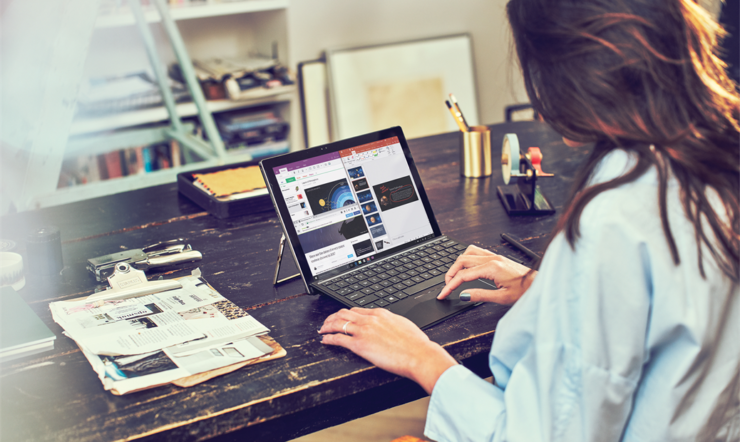 Woman using HP Spectre X2 Laptop