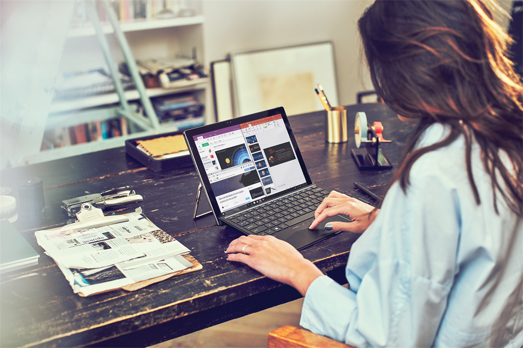 Woman using HP Spectre X2 Laptop