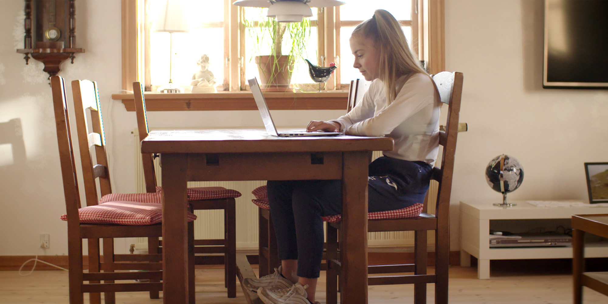 a person sitting on a chair in a room