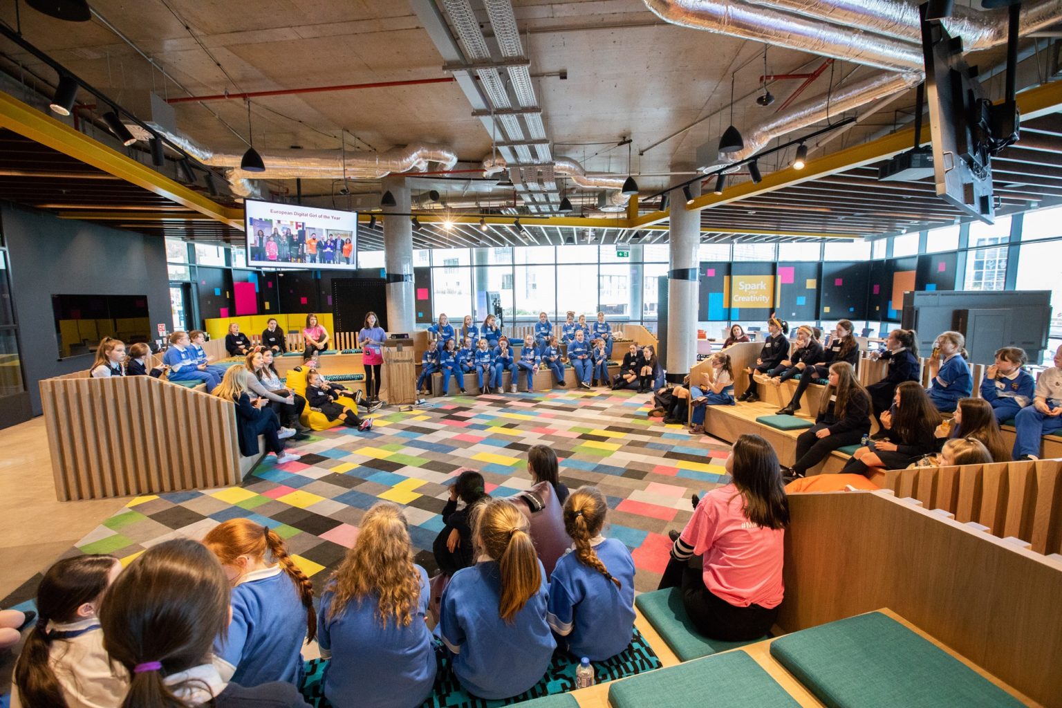 a group of people sitting around in a circle