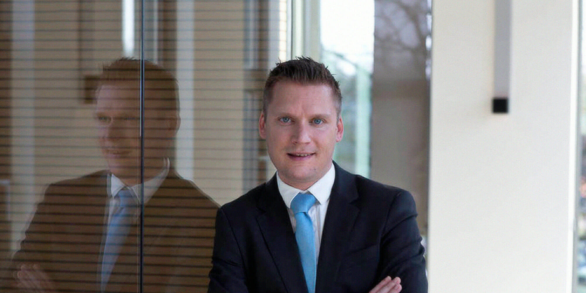 a man wearing a suit and tie