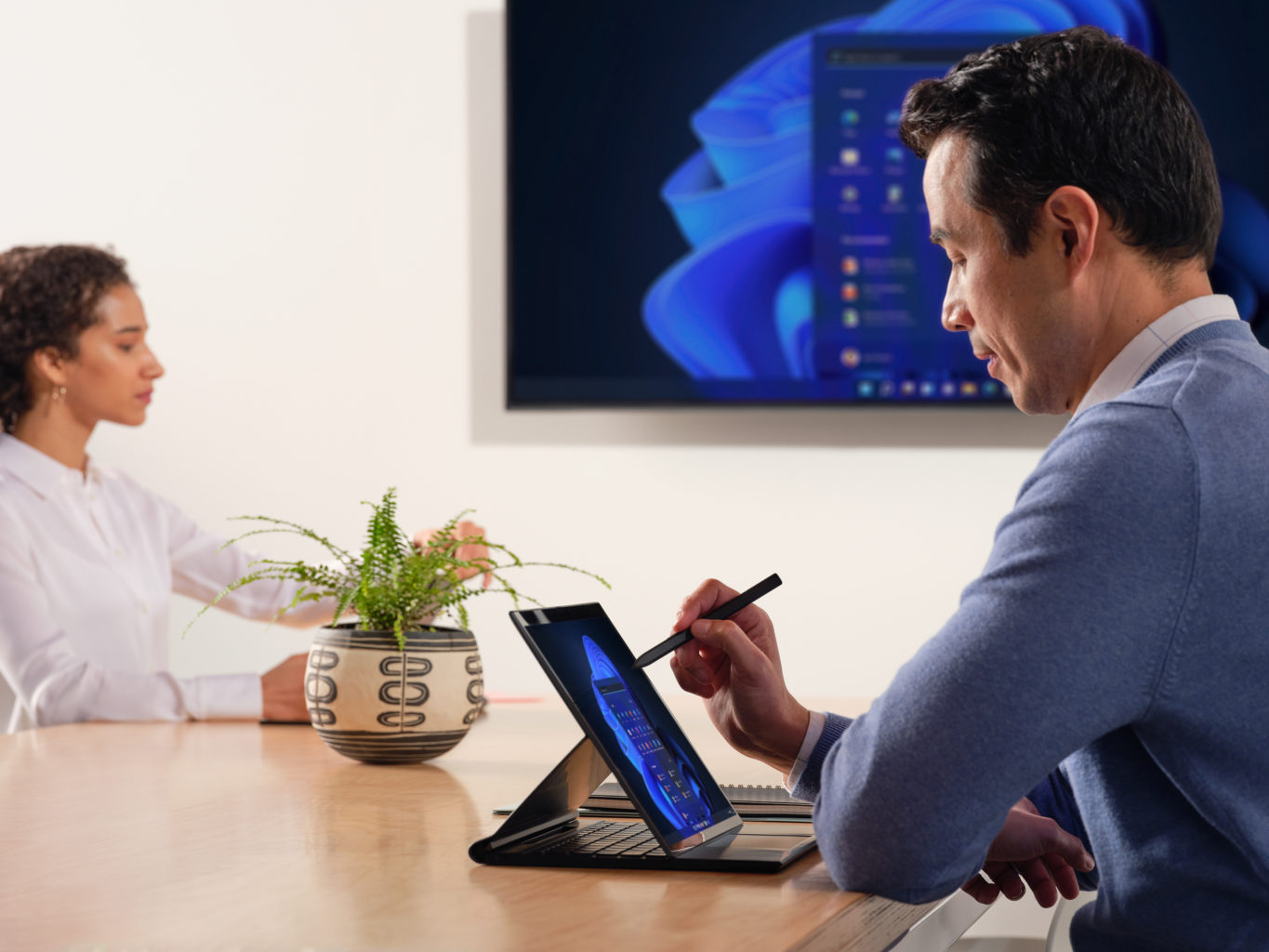 Two people working