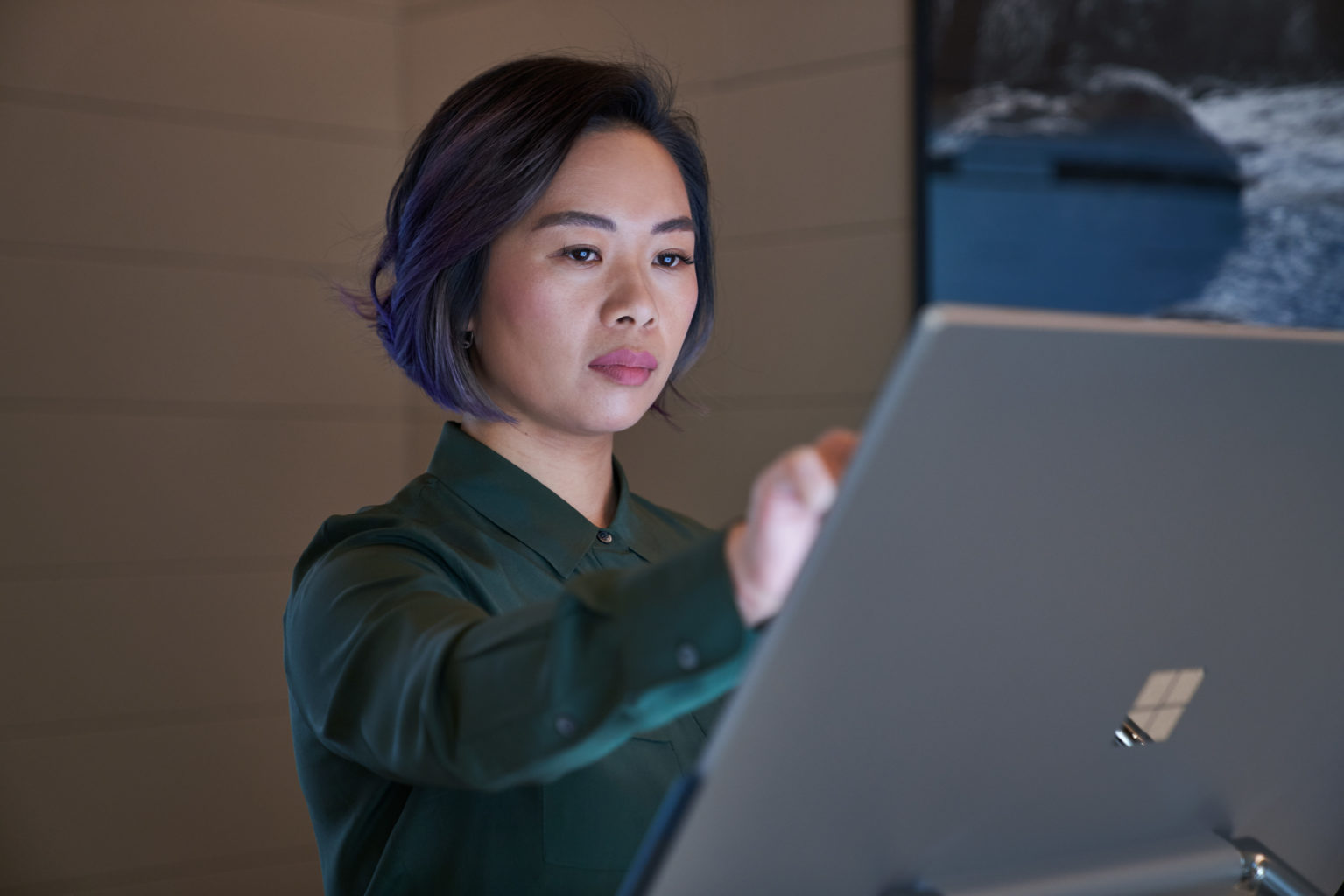 A woman touching screen