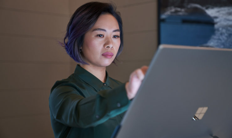 A woman touching screen